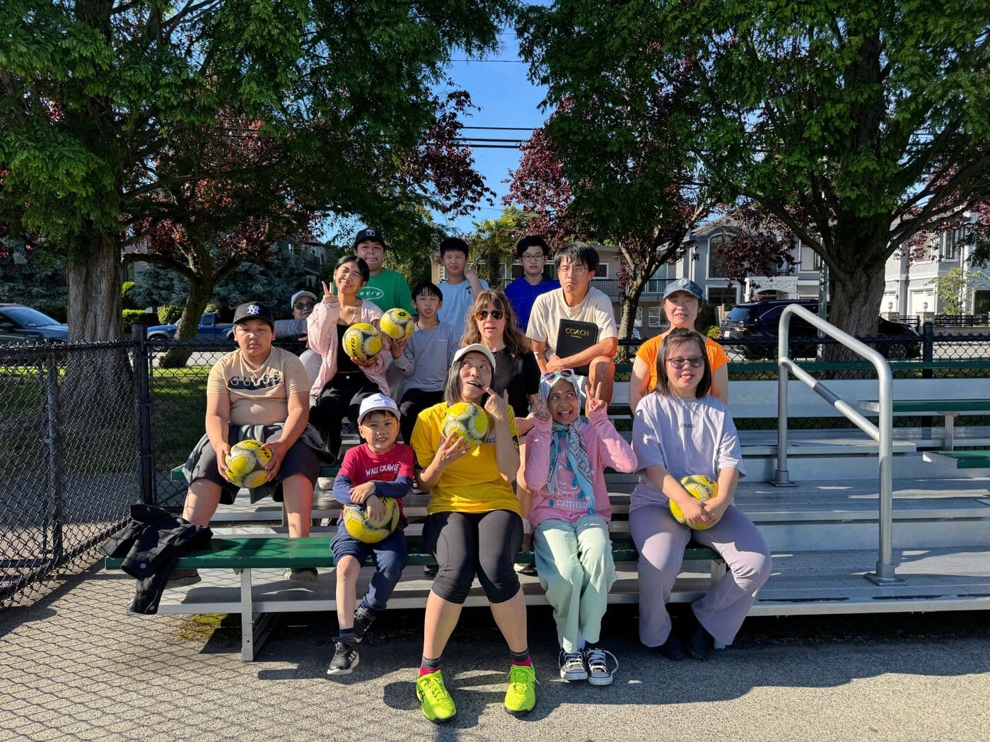 Soccer program group on the bleachers